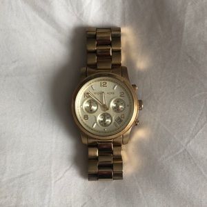 Authentic Michael Kors gold watch